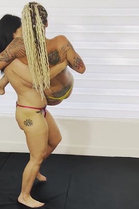 Topless Lift and Carry Featuring Nadia White and Andi Vicious