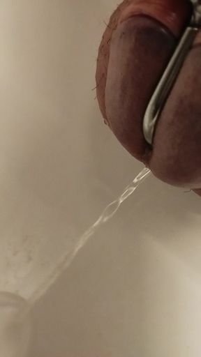 pissing with cage