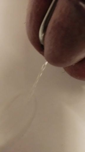 pissing with cage