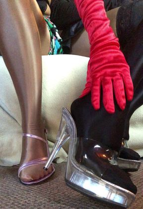 Sensual Teasing Close up Legs and Feet in Shiny Glossy Pantyhose and High Heels.