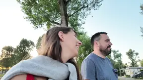 MILF mom gives a deepthroat blowjob in a field near a campsite
