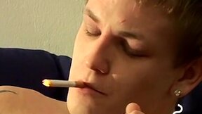 Tomy cant help rubbing his throbbing shaft while smoking