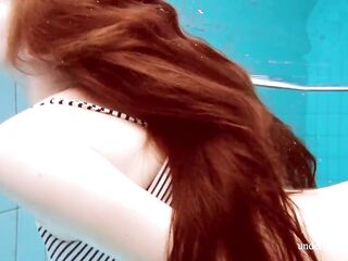 Hottest playgirl in open swimming pool absolutely in nature's garb