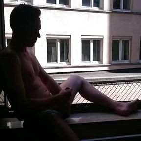 Short - Wanking in front of open hotelroom window with cumshot