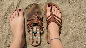 My living insole at the beach : shrunken slave used as a living insole , trapped in a flat sandal, trampled, smothered, crushed, buried in the sand