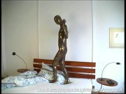 Spandex Magdi crawiling on bed