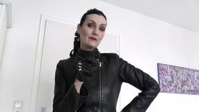 Lady Victoria Valente follows strict instructions while wearing black leather gloves