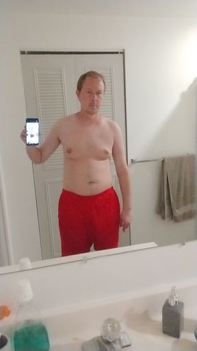 Nude boy in bathroom