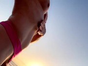 Mommy stroking her big uncut cock on the beach in front of admirers