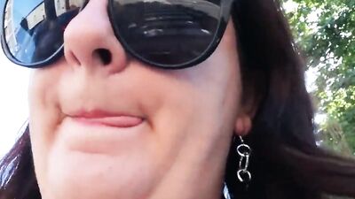 Slutty chubby woman films herself while flashing those tits in public