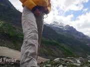 Traveler peeing in mountains - Angel Fowler