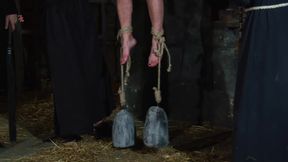 Blonde Girl Has Weights Attached to Her Feet and Is Hoisted up for Whipping