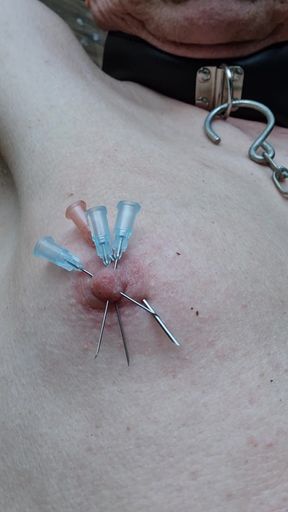 Tied to the cross whipped nipples