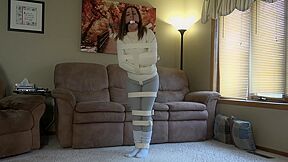 Jennifer straitjacketed, belted, and gagged