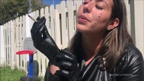 Smoking in leather gloves_