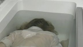 You are face down in bathtub where you try to go underwater and release a little air WMV HD 720p