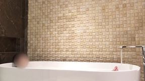 Japanese cutie soaks in bubble bath at luxury hotel