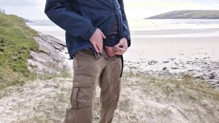 Peeing In Public. Taking A Urinate On The Deprived Island Beach.