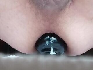 Riding butt plug and jerking off