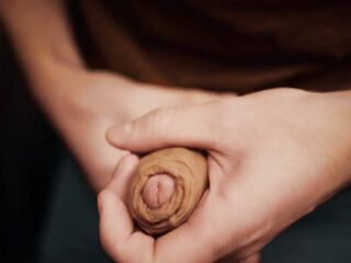 male with a big jock playing with his foreskin in 4K