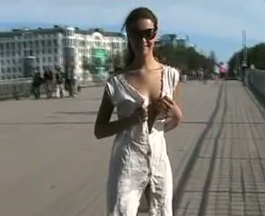 Dirty-minded flat chested Russian brunette was flashing her tits outdoors