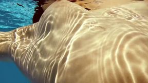 Blonde bombshell Fernanda Releve ditching her pink bikini to swim in the deep end, wet and wild
