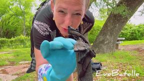 Gloved Dommy Goddess Empties Golden Nectar From Camping Toilet
