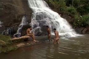 Three Latinos Fuck Under A Waterfall