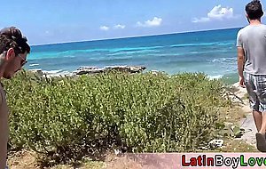 Latin guys celebrate gay pride on the beach outdoor