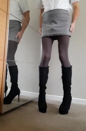 Sissy secretary wearing opaque tights, knee high boots, mini skirt whilst flashing cock