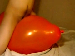 Big inflatable orange balloon humping cum