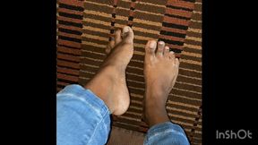 Rubbing Feet With Lotion