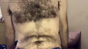 Hairy skinny man with bald blue eyes and uncut dick strips down on bed