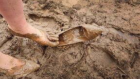 Louboutin in deep and slippery mud, louboutin stuck in mud, heels in puddles, heels wrecked in mud