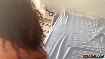 Busty Latin brunette with curly hair is moaning while having sex with a tattooed guy