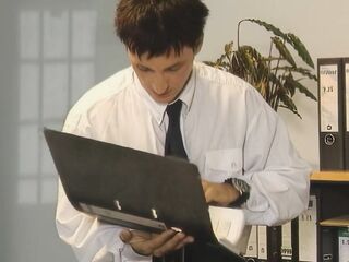 In the office, the secretary bows over and the boss falls for it.