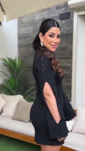 Amateur with big tits shows off her ass