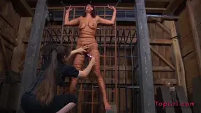 Submissive Redhead Screams in Pain Under Strict FemDom Torture Play