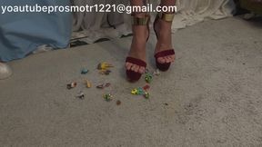 Nastya, in heels and barefoot, tramples various small figures and toys, steps on them, crushes them, walks on them. foot fetish, crush fetish, stomming, walking, legs