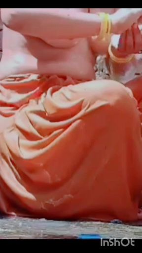While Bathing, the Village Woman Is Taking a Bath Naked After Taking off Her Clothes Completely