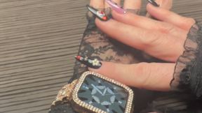 Harmony Shows Off Her Blingy Wrist Watch and Nails