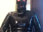 Full rubber gimp drools and wanks