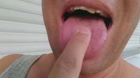 I slide with my index finger on the crack in the middle of my tongue