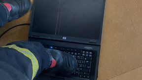 Firefighter crushing a Laptop 2