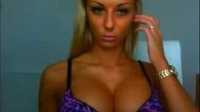 Big-breasted amateur girl shows her cleavage and smokes a cig