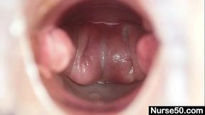 Aged blond lady shows off natural tits and dildo skills