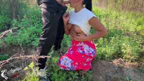 Out on the street, a hot babe sucks a cock and takes it in her pussy doggy-style. creampie!