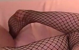 Horny Asian damsel Shino Izumi flaunts her meaty mounds in a footjob spectacle of porn!