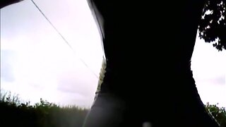 Latex cycling skinsuit in the rain