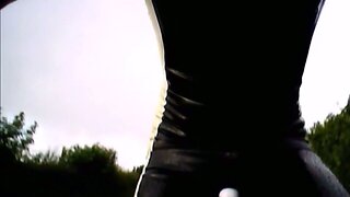 Latex cycling skinsuit in the rain